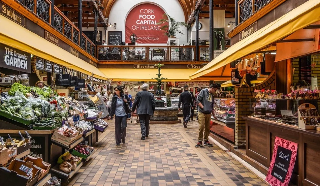 Shoppers in the English Market, a key stop on the private Blarney Castle tour from Dublin, enjoying local produce in Cork City.