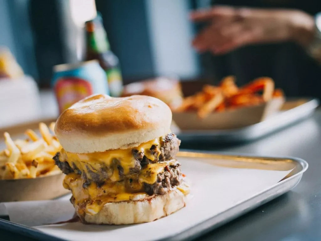 Fresh looking Burger and chips served in a famous place Bunsen