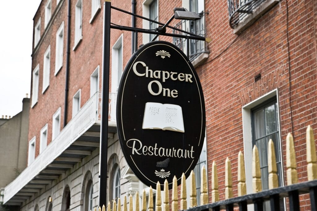 Chapter One restaurant outdoor sign on Dublin city street – fine dining Michelin-star restaurant in Dublin city centre.