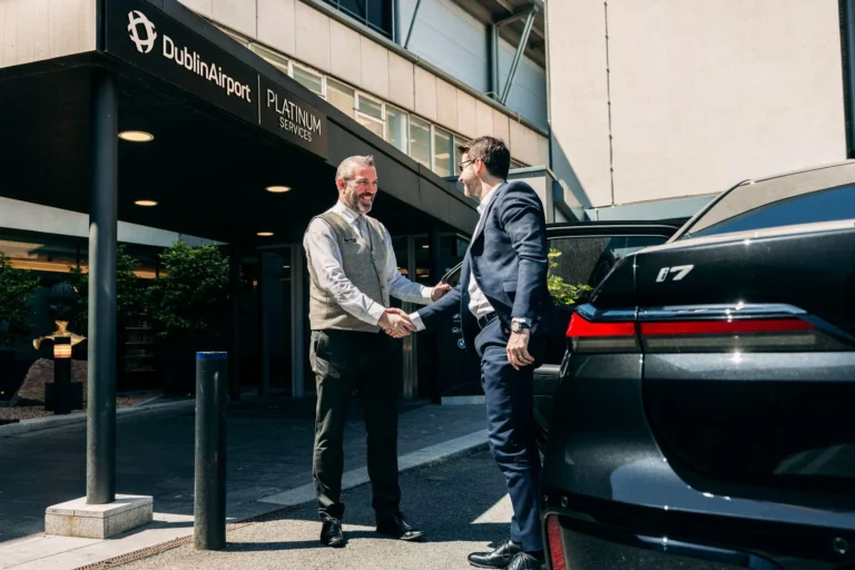 Platinum Service staff welcoming a client dropped by local chauffeur company