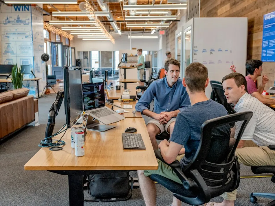 Business colleagues planning an itinerary, illustrative photo